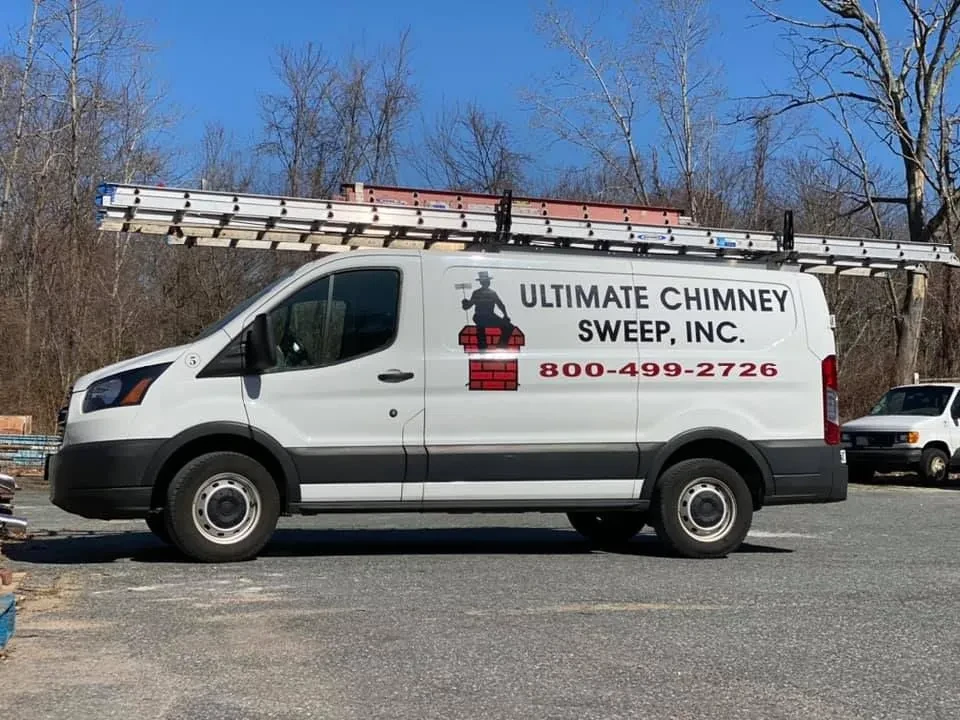 Ultimate Chimney Sweep company van parked on site