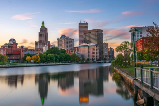 Providence, Rhode Island skyline along the river at dusk